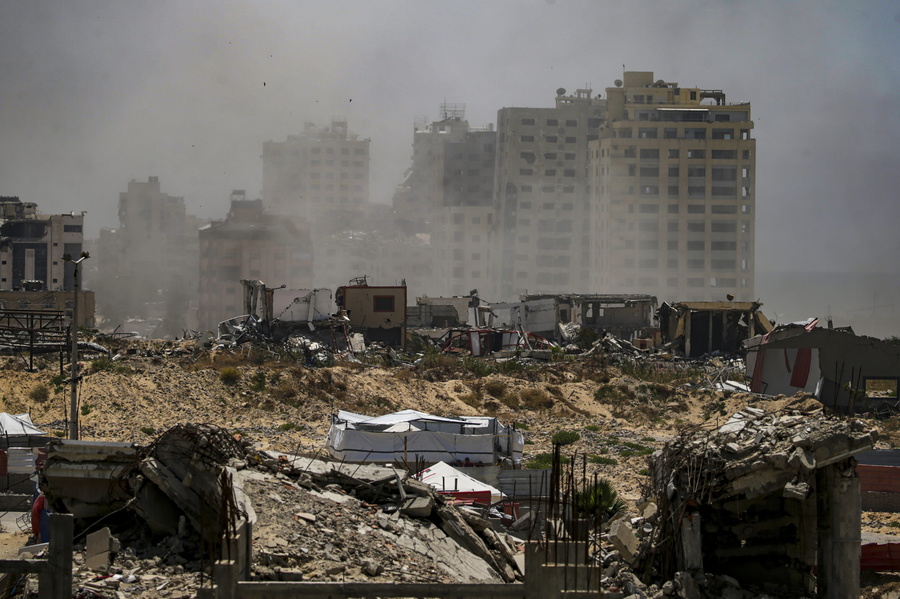 epa12106143 Smoke rises following an Israeli air strike near tents of Internally displaced Palestinians in the west of Gaza City on, 16 May 2025. More than 51,000 Palestinians have been killed in the Gaza Strip, according to the Palestinian Ministry of Health, since Israel launched a military campaign in the strip in response to a cross-border attack led by the Palestinian militant group Hamas on 07 October 2023, in which about 1,200 Israelis were killed and more than 250 taken hostage. EPA/MOHAMMED SABER